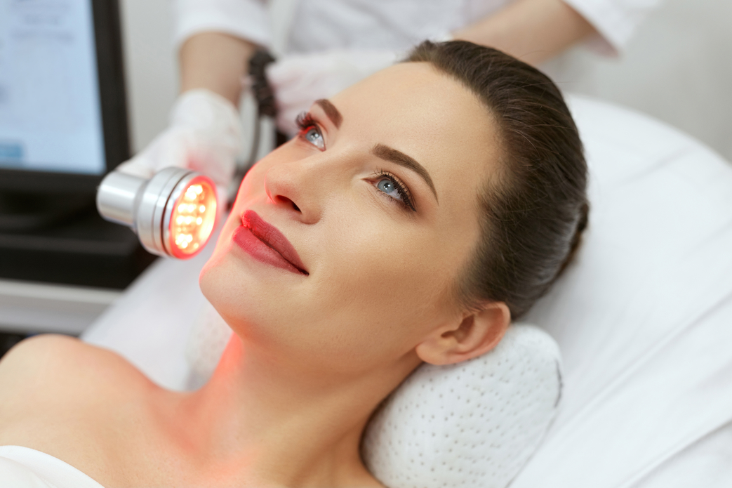 Red,Led,Light,Treatment.,Woman,Doing,Facial,Skin,Therapy